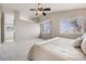 Large primary bedroom featuring an ensuite bath, plush carpet, and vaulted ceiling at 11223 Jansen St, Parker, CO 80134