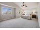 Spacious primary bedroom with large windows and a plush carpet at 11223 Jansen St, Parker, CO 80134