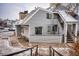 Exterior view of a gray two-story home with multiple levels and staircases at 17053 E Tennessee Dr # 101, Aurora, CO 80017