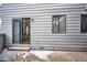 The home's exterior features a sliding glass door to the backyard and horizontal siding at 17053 E Tennessee Dr # 101, Aurora, CO 80017