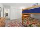 Spacious bedroom with bunk beds and ample closet space at 6405 S Dayton St # 105, Englewood, CO 80111