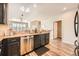 Beautiful kitchen view from the dining space, featuring a breakfast bar at 1817 S Buchanan Cir, Aurora, CO 80018