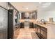 Well-equipped kitchen featuring stainless steel appliances and granite countertops at 1817 S Buchanan Cir, Aurora, CO 80018