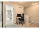 Functional office nook with modern desk and chair, ideal for productivity at 1817 S Buchanan Cir, Aurora, CO 80018