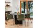 Cozy dining area featuring modern chairs, a round table, and natural light at 1 Winged Foot Way, Littleton, CO 80123