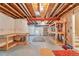 Unfinished basement with exposed beams and ductwork, with ample space for storage or customization at 6731 E 128Th Pl, Thornton, CO 80602