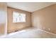 Bedroom featuring neutral walls, carpeting, and a picture window at 6731 E 128Th Pl, Thornton, CO 80602