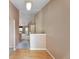 Inviting entryway featuring light hardwood flooring, neutral paint, and an open view into the living space at 6731 E 128Th Pl, Thornton, CO 80602