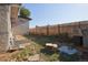 Backyard with partial fence at 1075 S Ames St, Lakewood, CO 80226