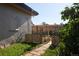 Backyard showing stone accents and wood fence at 1075 S Ames St, Lakewood, CO 80226