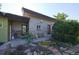 A spacious home with dual entries and xeriscape landscaping features at 1075 S Ames St, Lakewood, CO 80226