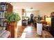 Bright office space with hardwood floors, ample desk space, and comfortable seating at 1075 S Ames St, Lakewood, CO 80226