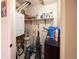 This small storage room has shelves stocked with household cleaning supplies and space for a vacuum at 1075 S Ames St, Lakewood, CO 80226