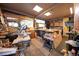 A spacious workshop with lots of tools, work bench, and natural light at 1075 S Ames St, Lakewood, CO 80226