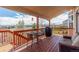 Outdoor deck offering seating, a grill, and expansive neighborhood and distant mountain views at 1122 Orion Way, Castle Rock, CO 80108