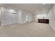 Spacious basement featuring neutral carpet, white walls, and a wet bar at 520 Columbine St, Denver, CO 80206