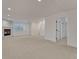 Finished basement featuring neutral carpet, a fireplace, and white trim at 520 Columbine St, Denver, CO 80206