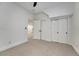 Spacious bedroom with neutral carpet, white walls, and closet offering ample storage at 520 Columbine St, Denver, CO 80206