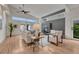 Bright living room features a modern fireplace, hardwood floors, and a ceiling fan at 520 Columbine St, Denver, CO 80206