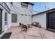 Inviting patio space with comfortable seating and string lights, ideal for outdoor entertaining at 520 Columbine St, Denver, CO 80206