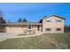 Attractive two-story home with an attached two car garage and landscaped front yard at 6298 S Harlan Way, Littleton, CO 80123