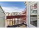 Balcony view features an exterior staircase and neighboring townhomes at 970 S Dawson Way # 15, Aurora, CO 80012