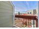 This balcony provides a neighborhood view and an exterior stairway at 970 S Dawson Way # 15, Aurora, CO 80012