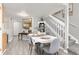 Bright dining room featuring a neutral palette, wooden floors, and elegant finishes, perfect for entertaining at 970 S Dawson Way # 15, Aurora, CO 80012