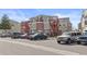 Apartment complex with visible parking and nearby landscaping, providing a functional and aesthetically pleasing environment at 970 S Dawson Way # 15, Aurora, CO 80012
