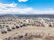 Scenic aerial view of neighborhood highlighting community layout, with mountain backdrop providing serene landscape at 5238 Clearbrooke Ct, Castle Rock, CO 80104