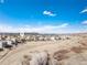 Neighborhood aerial shot showcasing community layout, ample space between homes, and mountain views in the distance at 5238 Clearbrooke Ct, Castle Rock, CO 80104