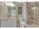 Bathroom featuring a glass shower, marble countertop, and modern fixtures at 5238 Clearbrooke Ct, Castle Rock, CO 80104