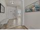 Bright foyer with tiled floors, white walls and an adjacent bedroom for easy access at 5238 Clearbrooke Ct, Castle Rock, CO 80104