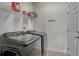 Convenient laundry room featuring modern appliances at 5238 Clearbrooke Ct, Castle Rock, CO 80104