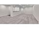 Finished basement area with carpeted floor and a counter with cabinets at 10115 Foxridge Ct, Highlands Ranch, CO 80126