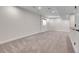 Spacious basement with neutral carpet, white walls, and recessed lighting at 10115 Foxridge Ct, Highlands Ranch, CO 80126