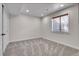 Bedroom with carpet, a window with blinds and white walls at 10115 Foxridge Ct, Highlands Ranch, CO 80126