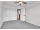Bedroom with neutral carpet, closet space and an entry to another room at 10115 Foxridge Ct, Highlands Ranch, CO 80126