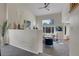 Spacious living room boasts high ceilings, ample natural light, and stylish decor creating an inviting space at 10115 Foxridge Ct, Highlands Ranch, CO 80126