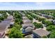 Community aerial shows lush green neighborhood with mature trees at 20455 E Grand Ln, Aurora, CO 80015