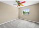 Bedroom with plush carpeting and large window to allow natural light in at 20455 E Grand Ln, Aurora, CO 80015