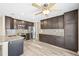 A well-appointed kitchen features stainless steel appliances and granite countertops at 20455 E Grand Ln, Aurora, CO 80015