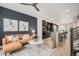 Stylish living room with modern furnishings, an open floor plan, and plenty of natural light at 9072 E 47Th Ave, Denver, CO 80238