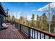 Inviting deck space with comfortable seating and scenic mountain views for relaxing and entertaining at 10756 Timothys Dr, Conifer, CO 80433