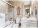Modern bathroom with a shower, vanity, and elegant fixtures at 8651 S De Gaulle Ct, Aurora, CO 80016