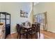 Formal dining room featuring hardwood floors, natural light, and ample seating for Gathering gatherings and entertaining at 10065 Cairns Ct, Highlands Ranch, CO 80130