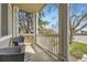 A pair of wicker chairs sit on the front porch of the house at 10065 Cairns Ct, Highlands Ranch, CO 80130