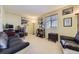A well-lit home office offers a productive workspace at 10065 Cairns Ct, Highlands Ranch, CO 80130