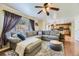 Spacious living room with plush seating, hardwood floors, and ample natural light, creating a comfortable gathering space at 10065 Cairns Ct, Highlands Ranch, CO 80130