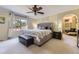 Main bedroom features a large window and a seating area at 10065 Cairns Ct, Highlands Ranch, CO 80130